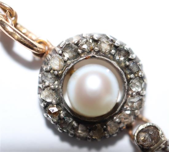 A yellow metal, rose cut diamond and cultured pearl set drop pendant, on a yellow metal chain, pendant approx. 28mm.